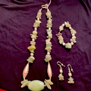 Necklace, bracelet and matching earring. Made of new jade silver pod beads.